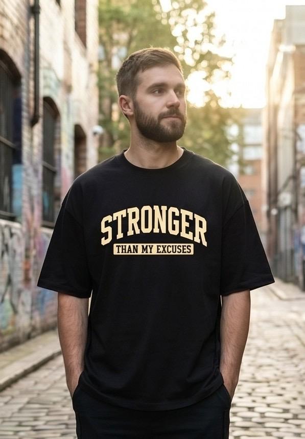 Black t-shirt with "Stronger Than My Excuses" text
