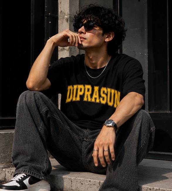 Black t-shirt and baggy jeans with black and white sneakers