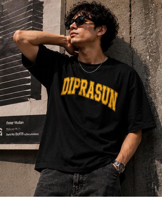 Black t-shirt with yellow DIPRASUN print, dark patterned jeans