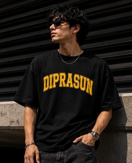 Black oversized t-shirt with yellow "DIPRASUN" print