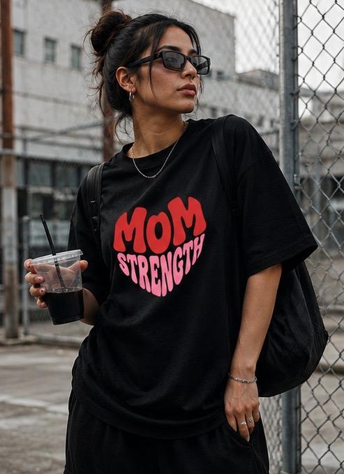 Black oversized t-shirt with red and pink heart graphic