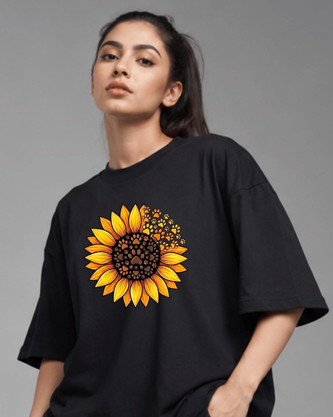 Black oversized tee with sunflower paw print graphic