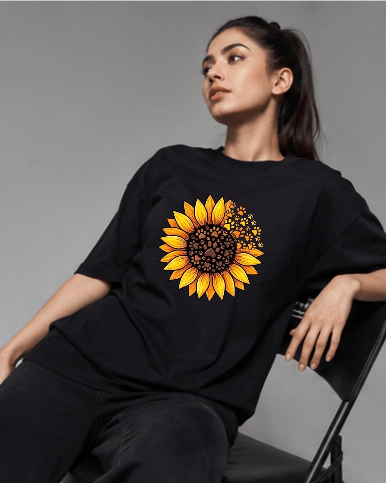 Black t-shirt with sunflower and paw print design